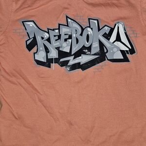 Reebok Graphic Tee in Orange